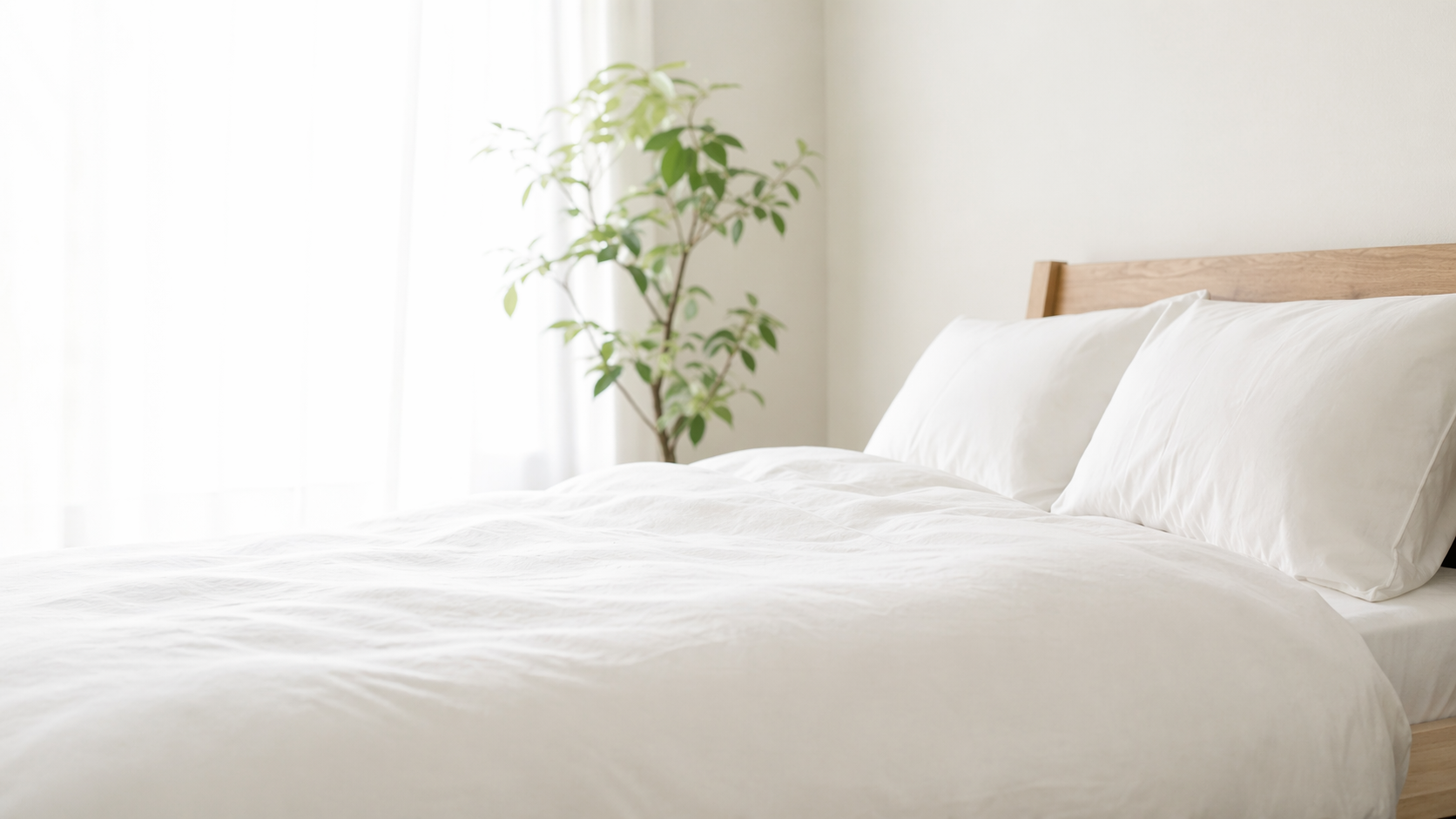 やわらかな寝室空間のヒーロー背景